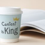 Content is king written on a paper cup